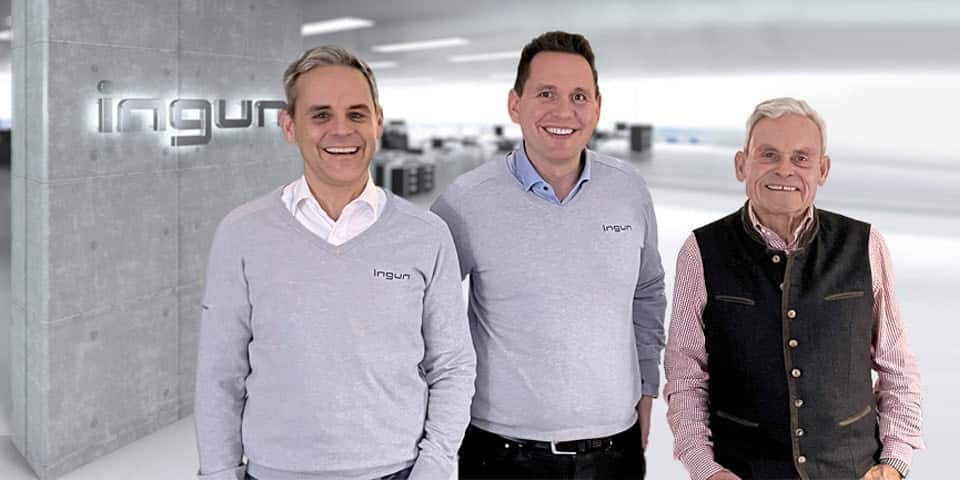 Armin Karl, Jochen Müller und Wolfgang Karl vor INGUN Logo