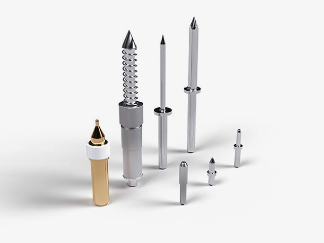 Tooling pins: spring-loaded with outer spring or with slide bearing